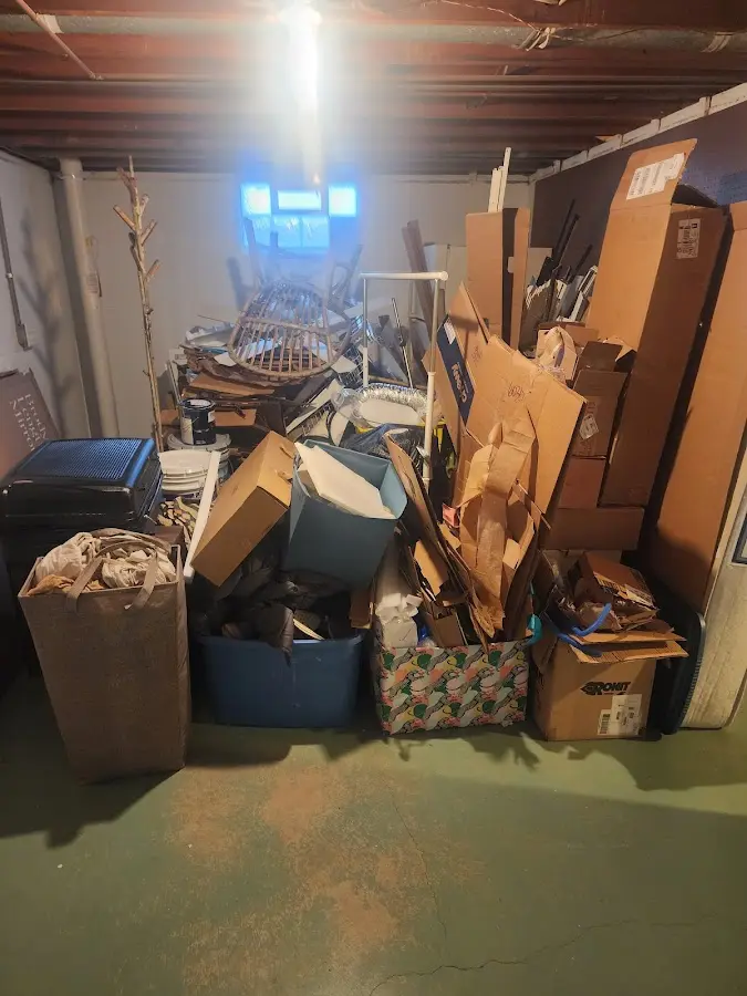 Roll-off dumpster container at job site for 6 Yard Dumpster Rental in Elroy